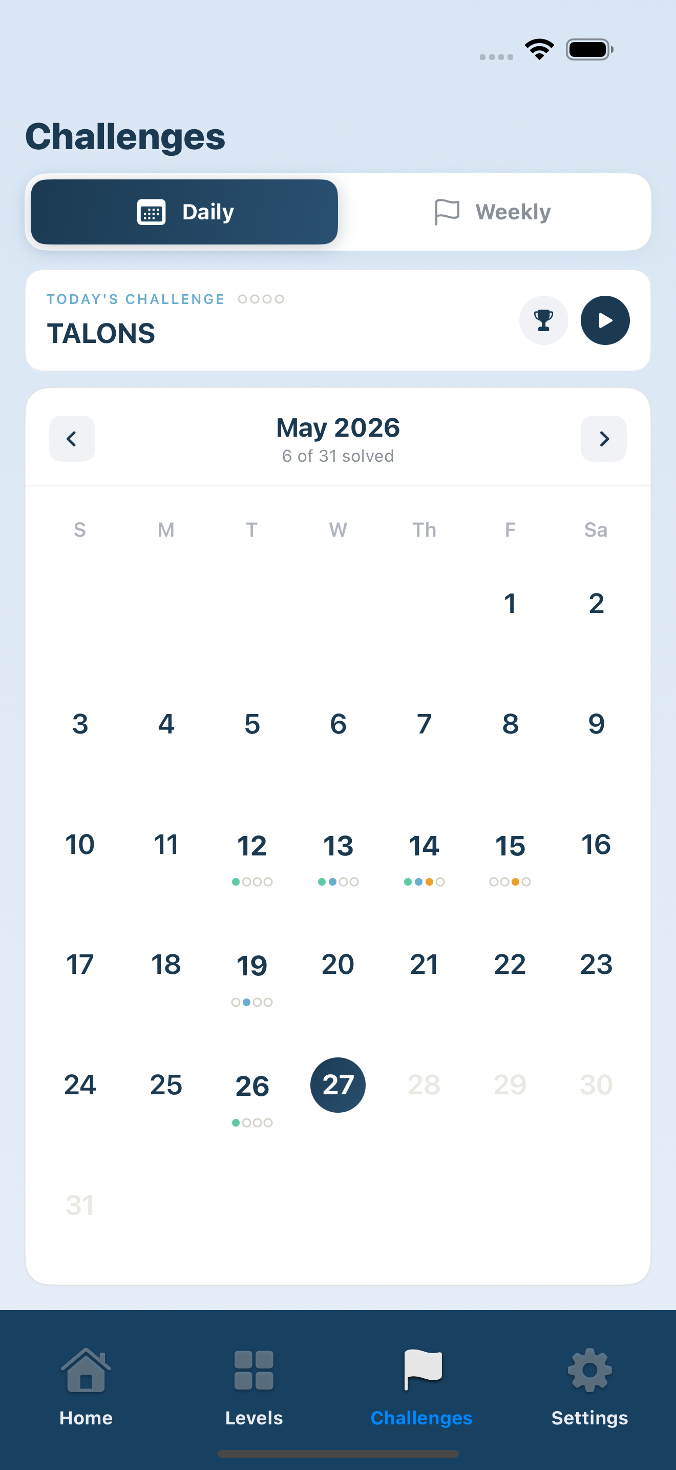 Lexoku iPhone app Daily Puzzle Calendar showing daily word puzzle challenges and completion streaks
